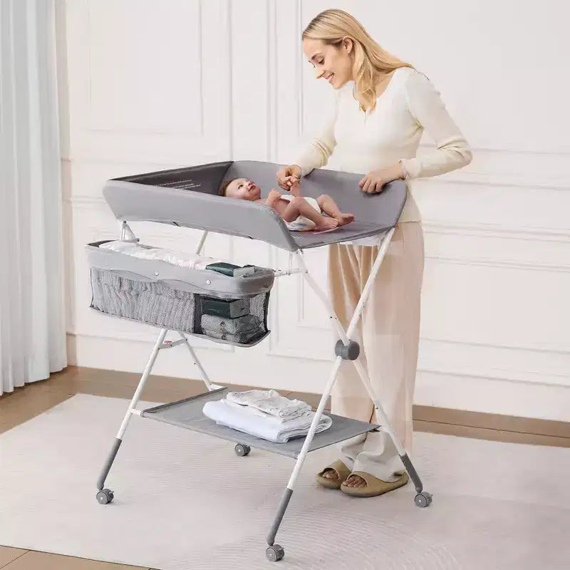 Table à langer pliable en métal avec roulettes verrouillables de 109 cm de haut