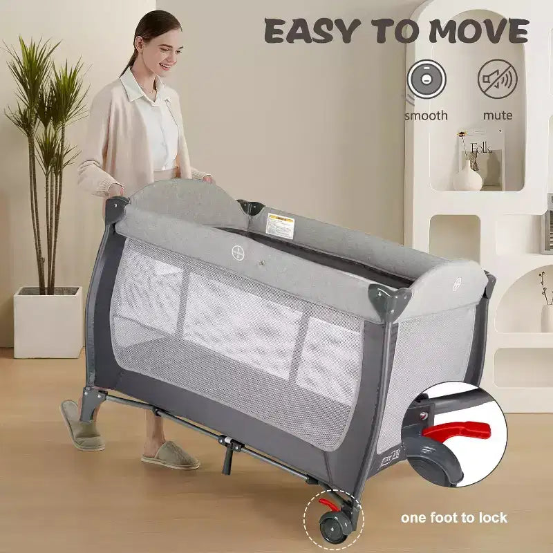 Berceau portable 4-en-1 en fer pour bébé avec table à langer et rangement 9,75 kg
